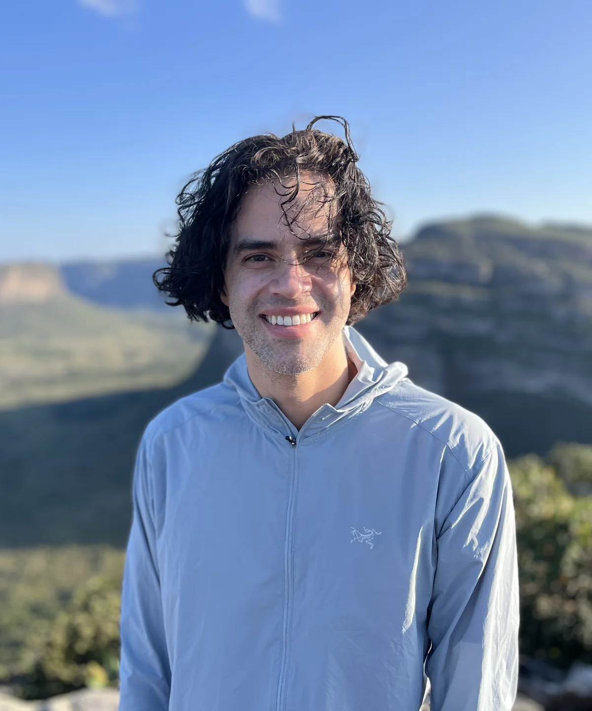 Carlos C.J. Alcantara smiling outdoors